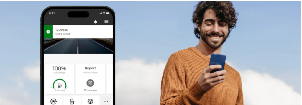 Person using a smartphone with the Uconnect app displaying vehicle status and remote lock confirmation.
