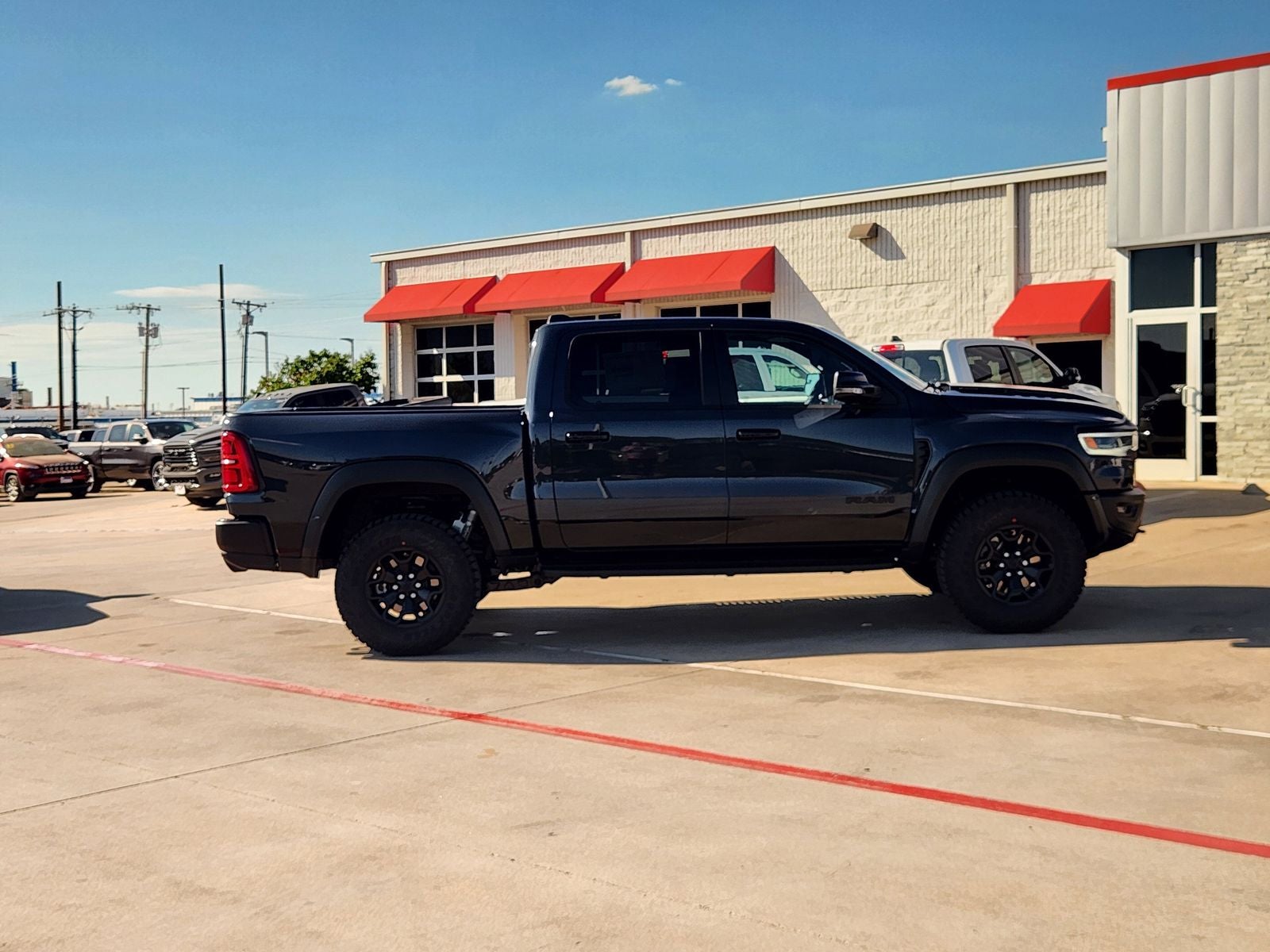 2026 RAM Ram 1500 RAM 1500 RHO CREW CAB 4X4 5'7' BOX